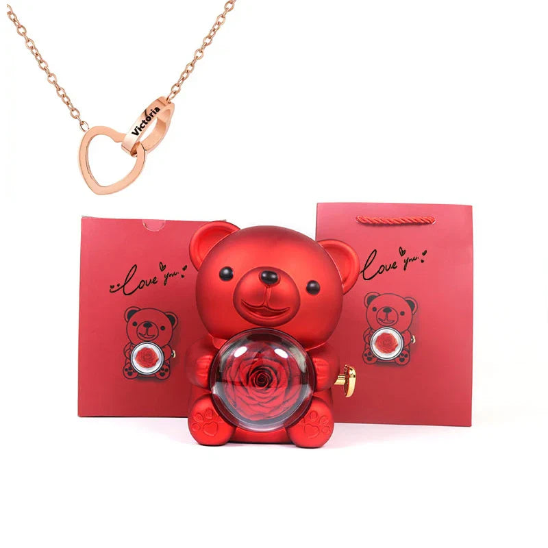 Urso Rotativo com Colar Dois Corações