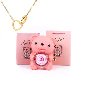 Urso Rotativo com Colar Dois Corações