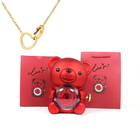 Urso Rotativo com Colar Dois Corações