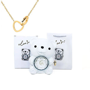 Urso Rotativo com Colar Dois Corações